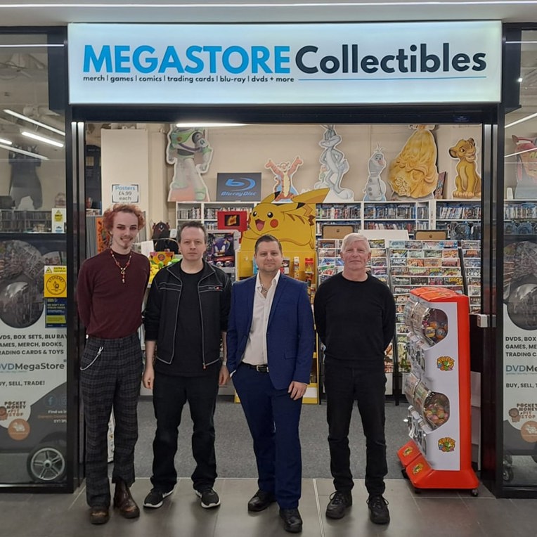The store team standing outside Megastore Collectibles